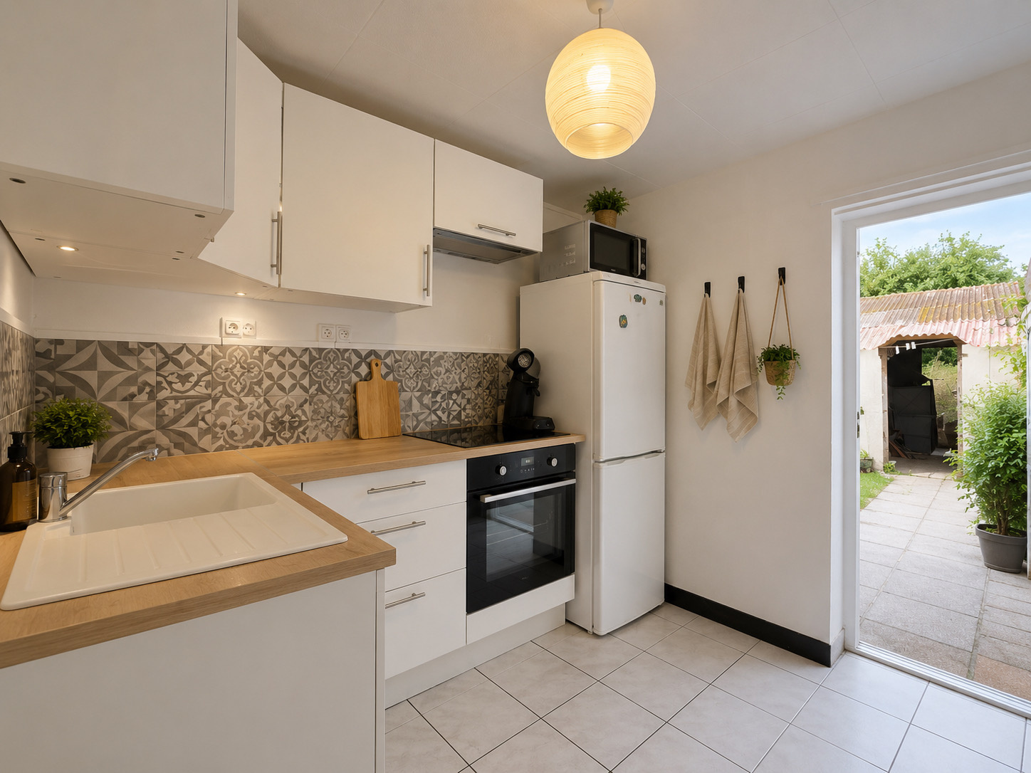 Immo80 – L'immobilier à Amiens et dans la Somme-CHAULNES – MAISON MITOYENNE – MAISON LOUE – 1 CHAMBRES – TERRASSE – DEPENDANCES – JARDIN